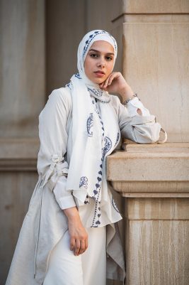 EMMA scarf Love Me White ,a white hijab with blue embroidery accents of pashmina and hearts.