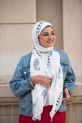EMMA scarf Love Me White ,a white hijab with blue embroidery accents of pashmina and hearts.
