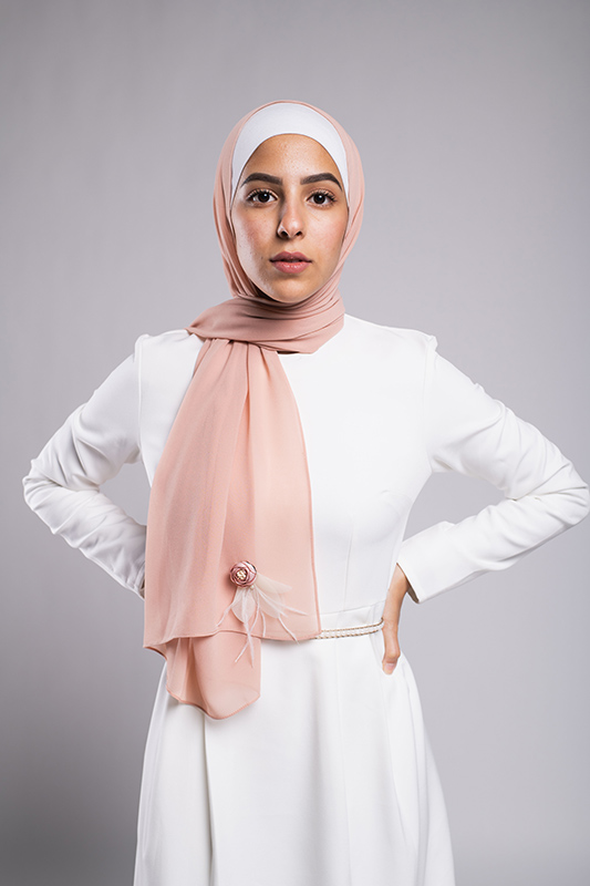 Diva In Blush EMMA Scarf Dazzle in Blush The satin flower is surrounded by organza leafs and feathers on a blush chiffon