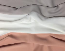 Flat lay of EMMA scarf Peach n Vanilla, chiffon blocks in the color of : coral , light grey and offwhite