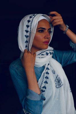 EMMA scarf Love Me White ,a white hijab with blue embroidery accents of pashmina and hearts.